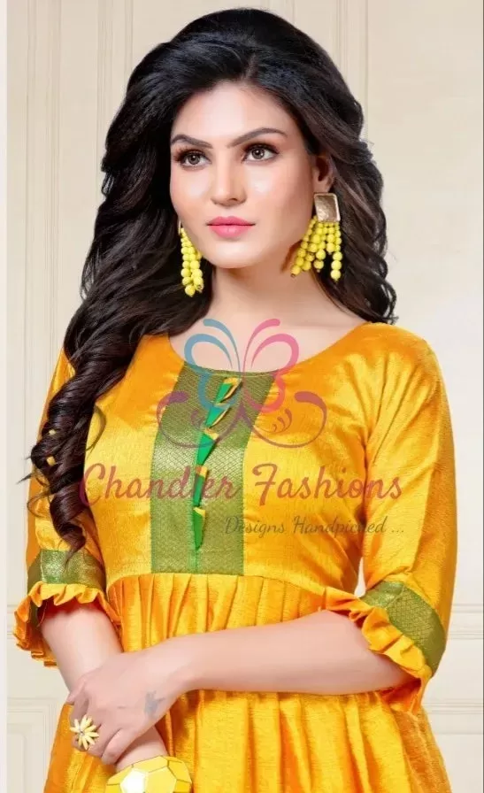 Alluring Yellow Color Aura Silk Kurti With Green Border